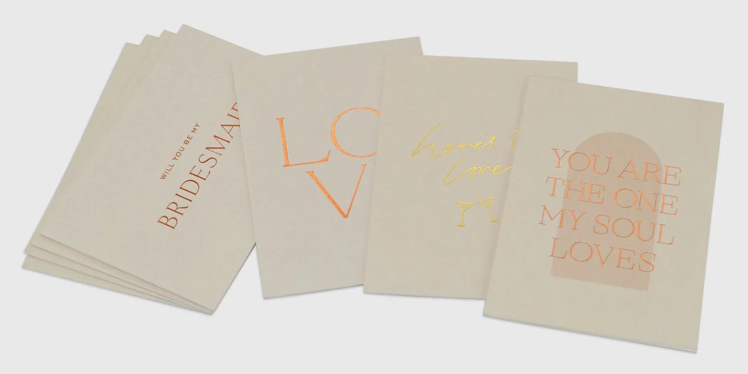 teured paper and foil greeting card